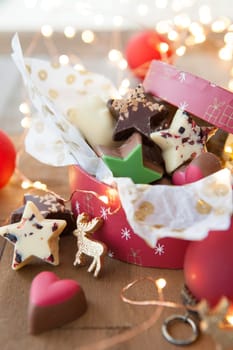 Small box with colorful chocolates for Christmas
