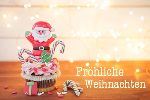 Small cupcake with sugar decoration for Christmas