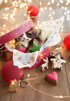 Small box with colorful chocolates for Christmas