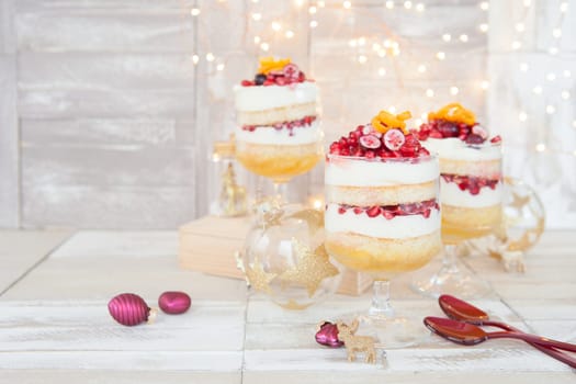 Dessert in layers with white chocolate mousse,orange and pomegranate