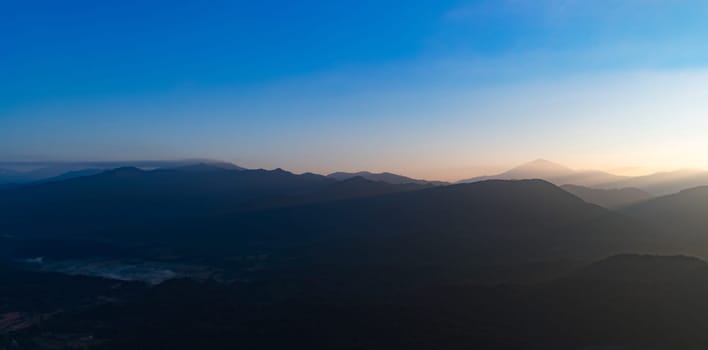 Aerial view of the mountains at sunrise. Beautiful panorama landscape. Vang Vieng. Laos.