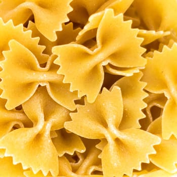 Uncooked farfalle pasta as background