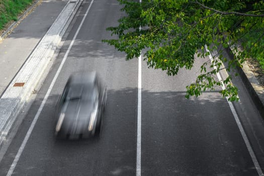 Motion blur of cars in aerial view over the road. (Speed limits - Infractions - Speed Cameras)