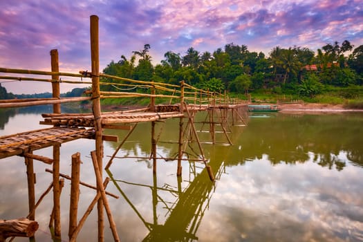 Beautiful view of a bamboo bridge. Luang Prabang. Laos landscape.