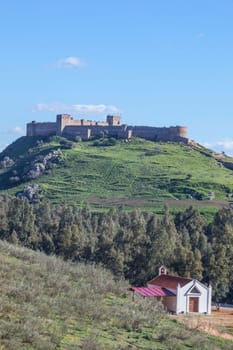 Medellin castle from outskirts and hermitage, Spain
