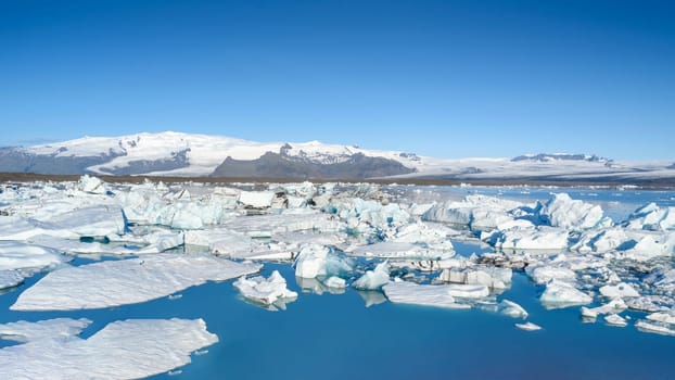 Scenic view of icebergs in Jokulsarlon glacier lagoon, Iceland, selective focus