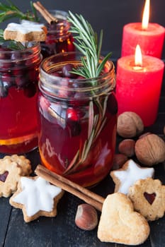Hot punch with cranberry,cinnamon and rosemary