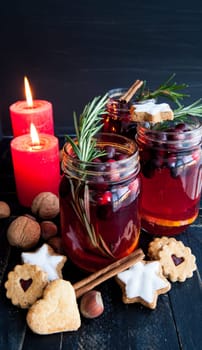 Hot punch with cranberry,cinnamon and rosemary