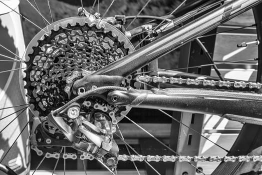 Madrid, Spain - July 11, 2016: Bike chain links and cogs on road race bike. Black ans white shot
