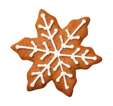 Gingerbread snowflake cookie for christmas isolated on white background. Top view