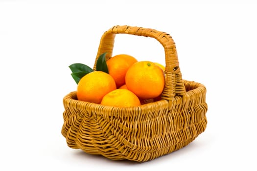 tangerines in a basket on white background