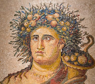 Madrid, Spain - November 11, 2017: Roman polychrome mosaic with the representation of Genius of the Year at National Archeological Museum of Madrid