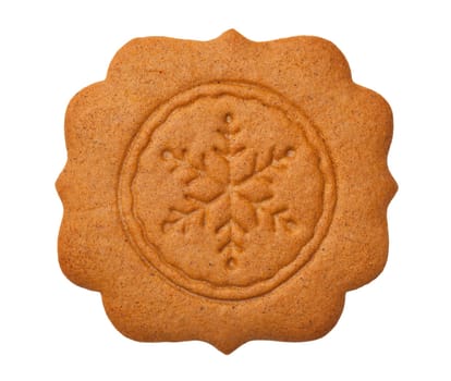 gingerbread cookie in shape of label with snowflake isolated on white background. top view