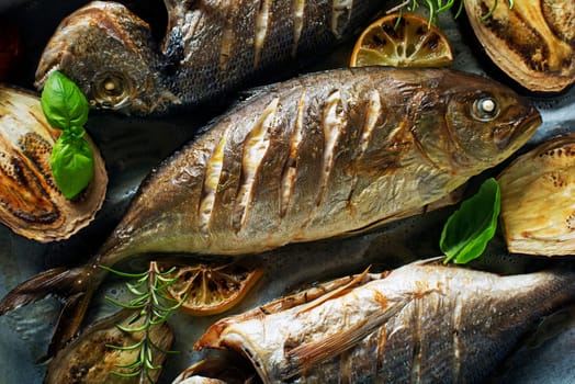 Grilled sea fish with lemon herbs and spices