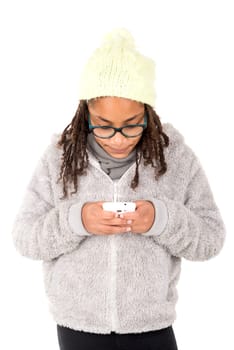 Young girl posing with cellphone isolated in white
