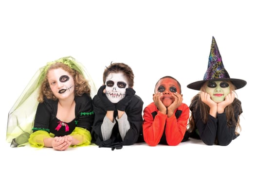 Kids with face-paint and Halloween costumes isolated in white