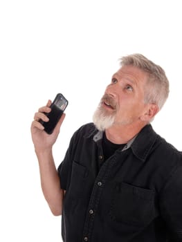 A portrait of a middle age man holding up his cell phone, shocked and.surprised about the message, isolated for white background.