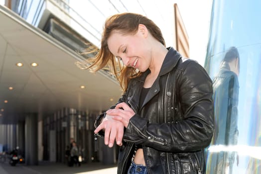 Woman looks at clock