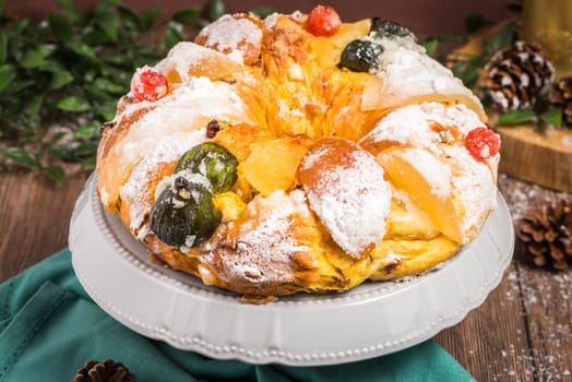 Bolo do Rei or King's Cake, Made for Christmas, Carnavale or Mardi Gras with Present Wrapping in Background