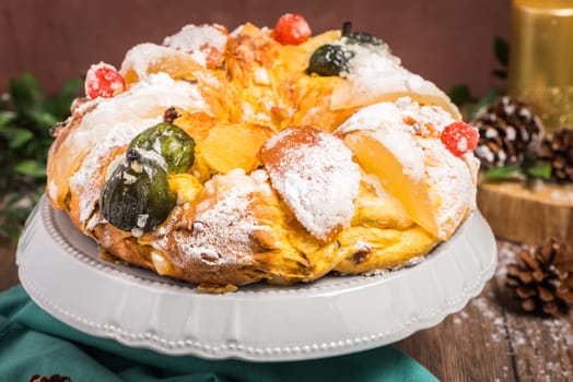 Bolo do Rei or King's Cake, Made for Christmas, Carnavale or Mardi Gras with Present Wrapping in Background