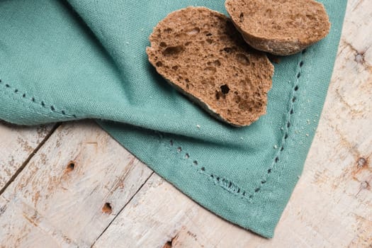 Malt loaf bread slices on table.