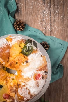 Bolo do Rei or King's Cake, Made for Christmas, Carnavale or Mardi Gras with Present Wrapping in Background