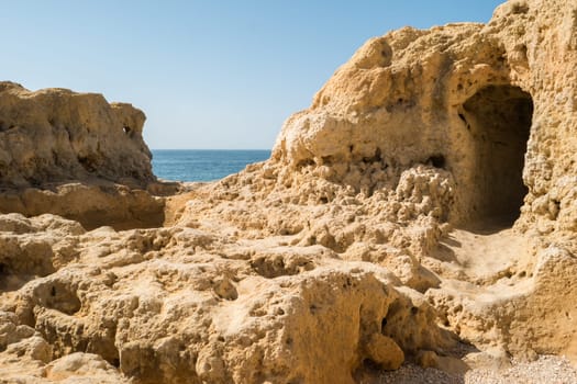 Summer Atlantic ocean rocky coastline near Carvoeiro town, Lagoa, Algarve - Portugal.