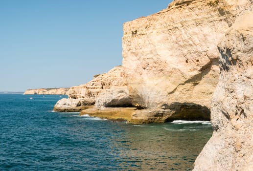 Summer Atlantic ocean rocky coastline near Carvoeiro town, Lagoa, Algarve - Portugal.