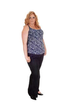 A heavy woman standing in black dress pants and blouse with blond long.hair isolated for white background.