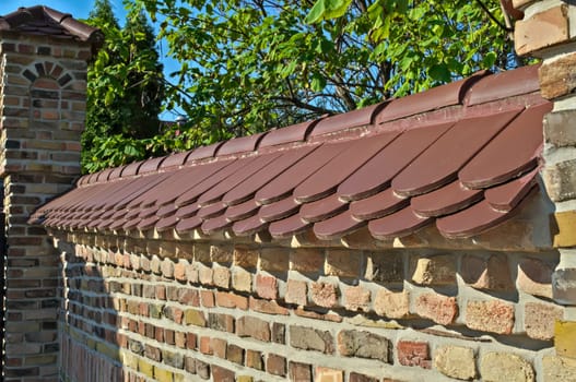 Brick fence wall at kac monastery, serbia