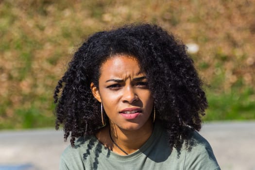 Portrait of an attractive African-American woman. Outdoor Shooting.