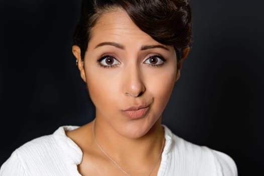 Beautiful woman with crooked smile expression
