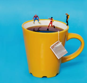 conceptual diver jumping in a tea cup