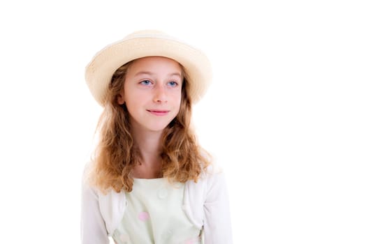 nice girl with blond hair in white dress and straw hat