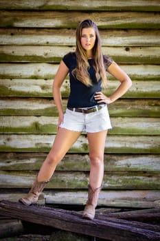 Beautiful country fashion girl wearing boots