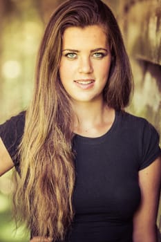 Smiling young woman with long hair