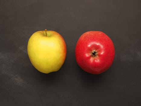Fresh organic apples on a chalkboard, healthy food concept image