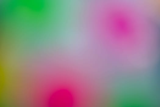 Defocused warm yellow, pink and green summer colors background overlay