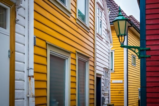 Traditional yellow and white houses in the old part of Bergen town, Norway