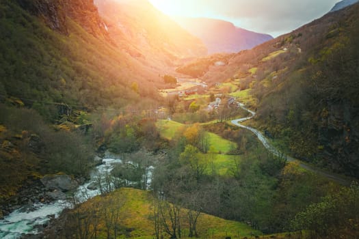 Small homes in a Flam village located in a beautiful mountain valley in autumn, Norway