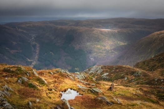 Dramatic landscape of mountains from Mount Ulriken above Bergen city, Norway