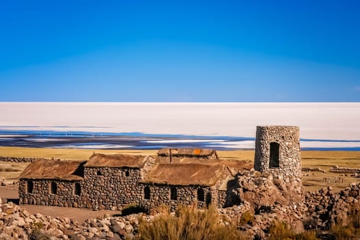 Old primitive abandoned building in a tiny village on the shore of Salar de Uyuni in Bolivia