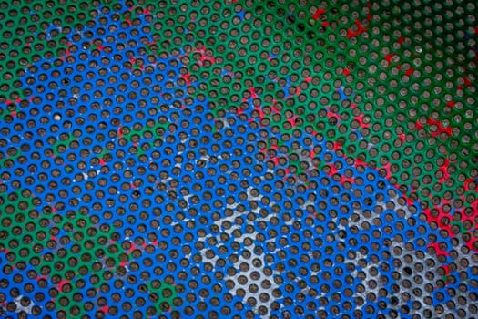 Colourful circle patterns on the painted metal bench