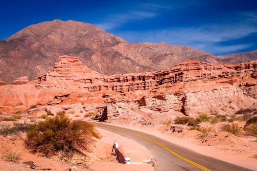 Road through colourful polychromic mountains in Northern Argentina