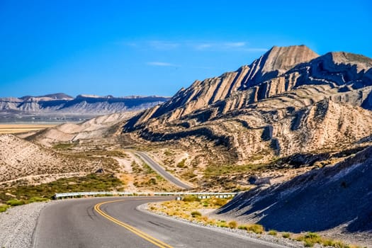 Famous Ruta 40, known as Ruta Quarenta, passing through some impressive and strangly shaped mountains in northern part of Argentina