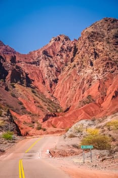 Road through colourful polychromic mountains in Northern Argentina