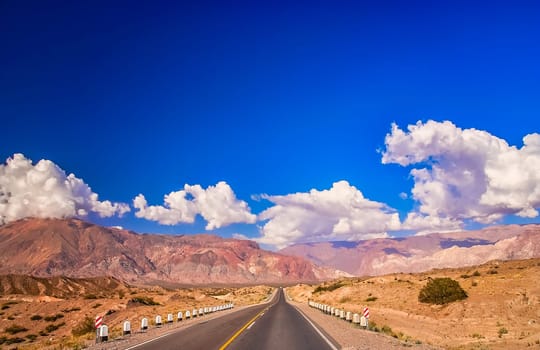 Winding road through stunning mountain scenery from Mendoza in Argentina to Chile over the Andes range