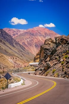 Winding road through stunning mountain scenery from Mendoza in Argentina to Chile over the Andes range