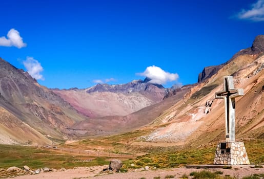 Cross standing on the rock near Aconcagua National Park