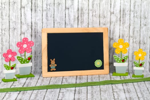 Decorative wooden flowers with empty panel